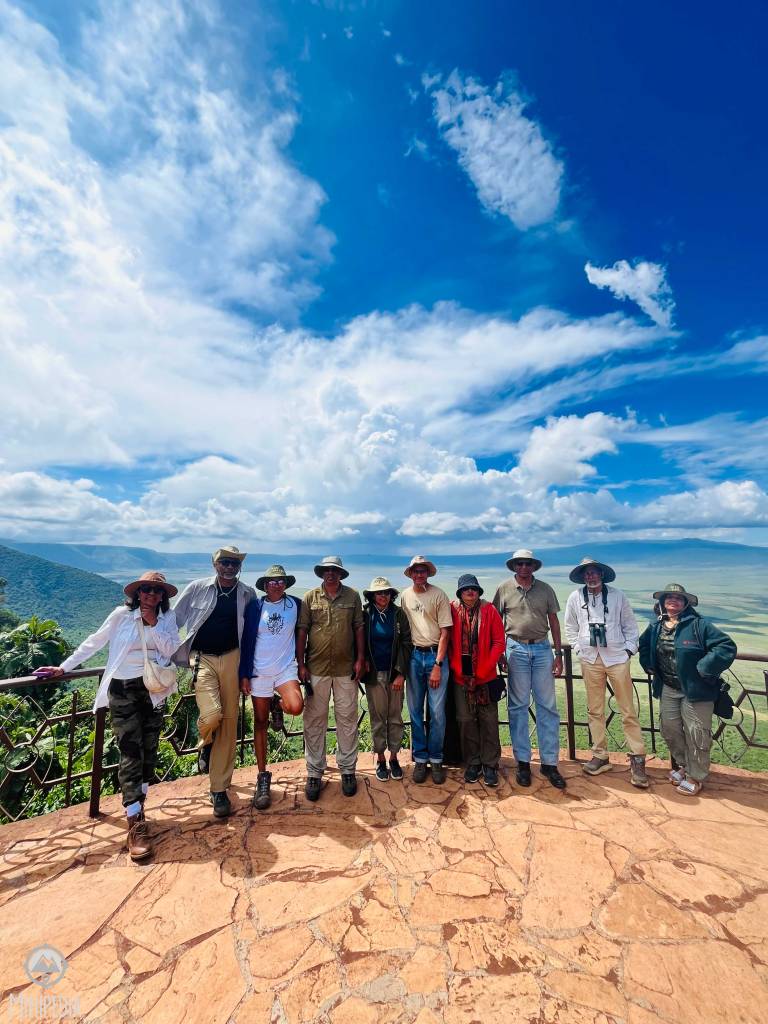12 travellers at the edge of the crater